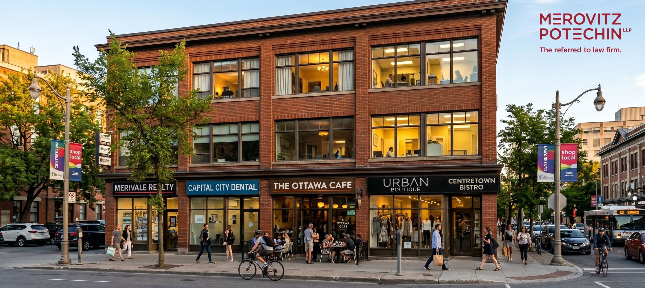 A wide-angle photograph of a mixed-use commercial property in Ottawa, demonstrating the complexities of commercial property due diligence with tenants. The building features several active ground-floor businesses, including a realty office, a dental clinic, a cafe, and boutiques, illustrating diverse commercial tenancies that a new owner would assume.